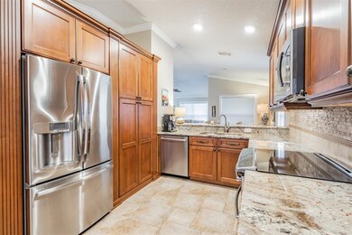 Stone countertops and rich cabinetry