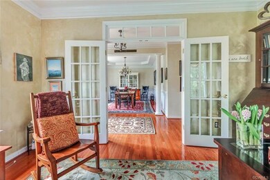 Living room looking across foyer to dining room - 