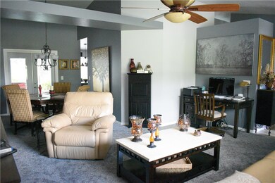 French doors leading out to the pool with built  i