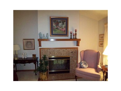 Living Room. 2-sided fireplace with mantel.