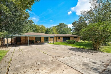 Side driveway is triple wide + circle driveway in