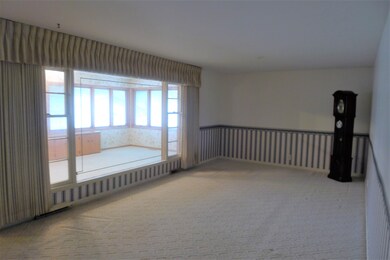 Large window to view sunroom from living room!