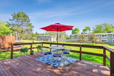 Wooden terrace with a lawn