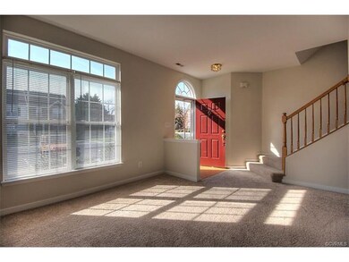 Spacious living room with new carpet and paint Mar