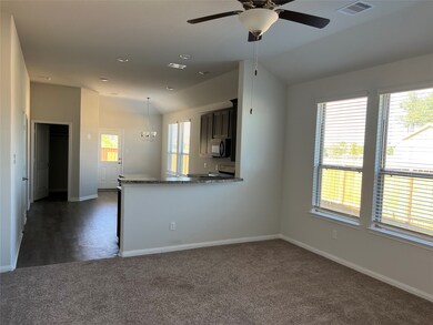 Family room is adjacent to kitchen