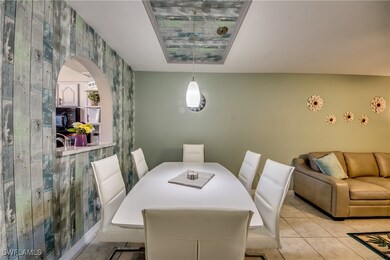 Dining area featuring light tile patterned floors