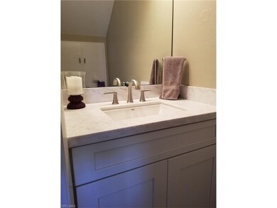 1/2 bath with new vanity and dual flush toilet