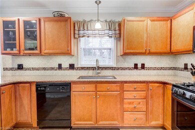 Gorgeous New cabinetry & New backsplash.