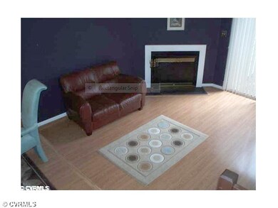 Living Room - Sunken Living Room with Fireplace