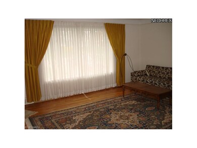 Livingroom has big newer picture window with gorge