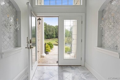 Doorway to outside with light tile patterned floor