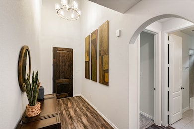 Two Story Entry featuring gorgeous floors and upgr