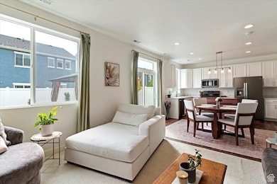 Living room featuring recessed lighting and wood finished floors