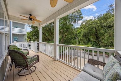 Deck featuring a ceiling fan