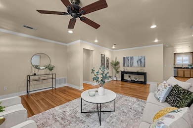Living area featuring light wood-style flooring, 
