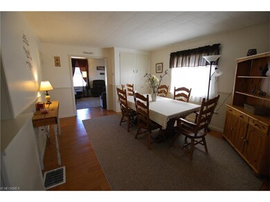 Large Dining Room with Laminate Floors