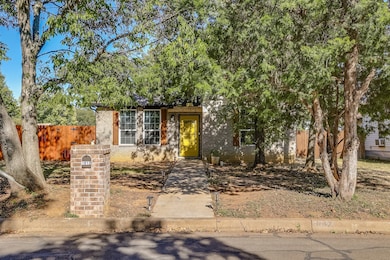 View of front of property with brick siding