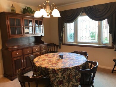 Leaded glass, bay window in dining room.