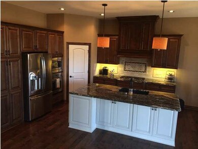 Walk in Pantry. Stainless steel appliances.