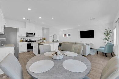 Dining space featuring recessed lighting, visible