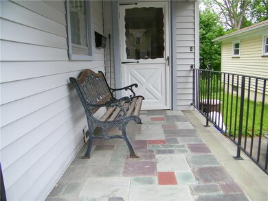 Front porch with a slate floor.