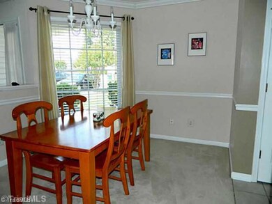 Dining Room. Chair railings add to this space