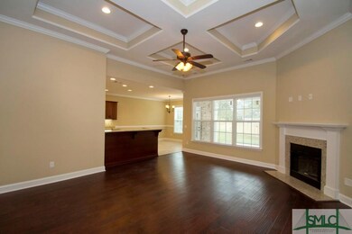 A Coffered Ceiling and Gorgeous Wood Floors Finish