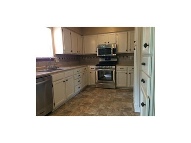 Lots of cupboard space and new linoleum.