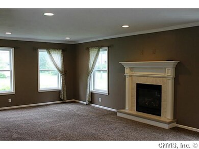Great Room. Crown moldings also grace this room.