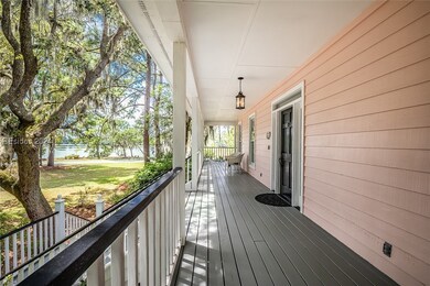 Wooden terrace with a lawn