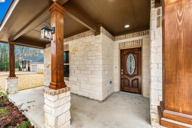 The charming front porch invites you to step inside and discover the wonders within.