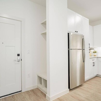 Mudroom with light wood-type flooring