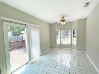Dining Area. Wood deck on the left through glass s
