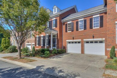 2 car garage with sink & storage cabinetry