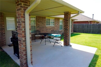 Covered patio with extended concrete