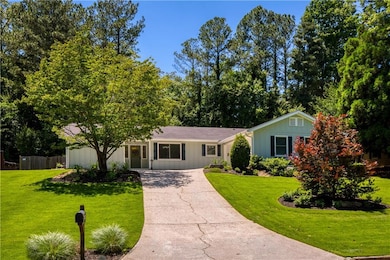 A wider look at the lush front lawn and beautifully maintained yard just 2 miles from the heart of Historic Roswell.