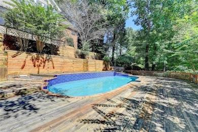 View of swimming pool featuring a fenced backyard