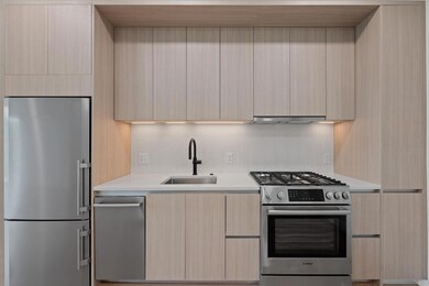 Kitchen featuring appliances with stainless steel