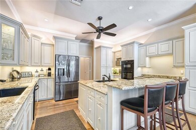 Chef's Kitchen with two sinks, stainless refrigera