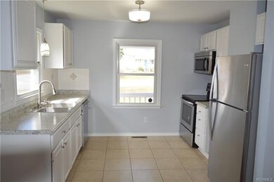 New stainless steel appliances, countertops,light 
