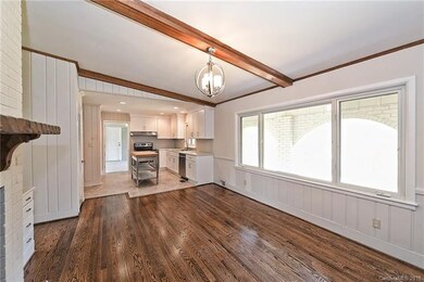 Wooden Beams add interesting detail to the Den--ag
