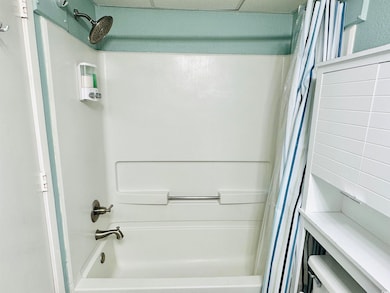 Bathroom with shower / tub combo