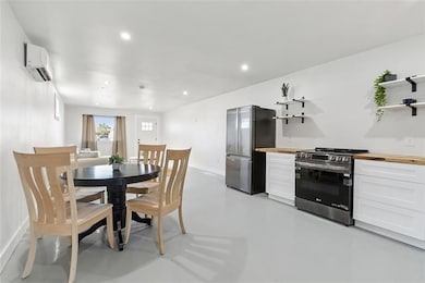 Dine beneath recessed lighting in the seamless din