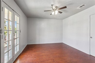 Upstairs bedroom with French doors