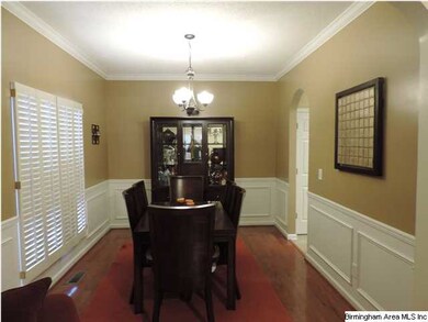 FORMAL DINING ROOM WITH WAINSCOTTING , CHAIRRAIL, 