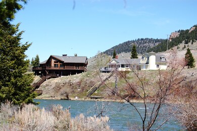 Both houses from River Side with Tree