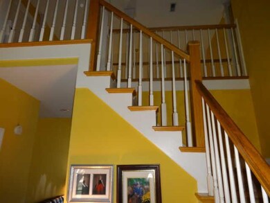 Entry with beautiful staircase