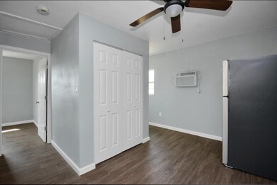 Breakfast area open to kitchen. Double doors give