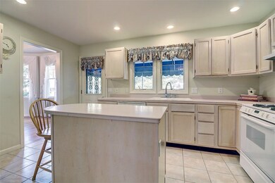Fully Equipped Kitchen with Corian Counters