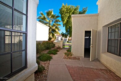 Front Walkway and Garage Entrance